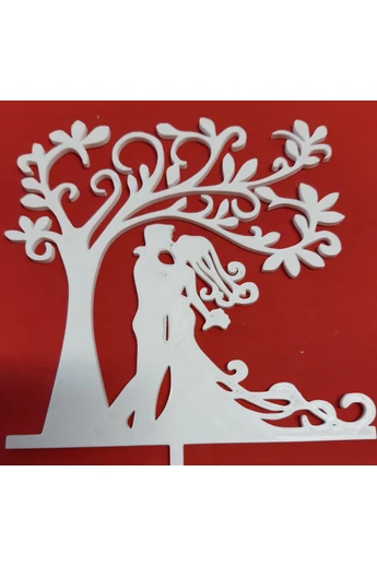 Tortadísz sziluett beszúró esküvői nászpár életfa alatt (fehér) Tortadísz sziluett beszúró esküvői nászpár életfa alatt (fehér)